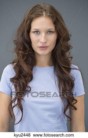 Portrait of a beautiful woman posing View Large Photo Image Stock Photo - Portrait of a beautiful woman posing. Fotosearch