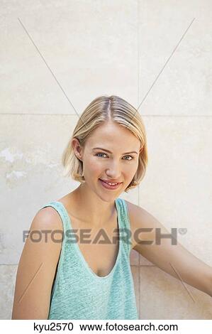 Portrait of a beautiful woman smiling View Large Photo Image Stock Image - Portrait of a beautiful woman smiling. Fotosearch