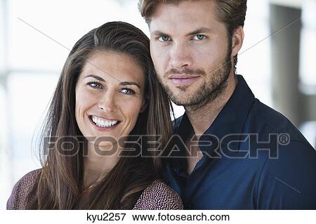 Stock Photo - Portrait of a couple smiling. Fotosearch
