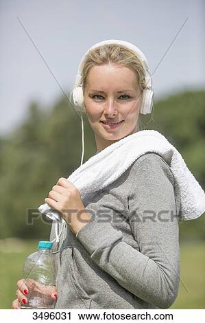 Portrait of a pretty blonde woman doing sport in park View Large Photo Image Stock Image - Portrait of a pretty blonde woman doing sport in park. Fotosearch