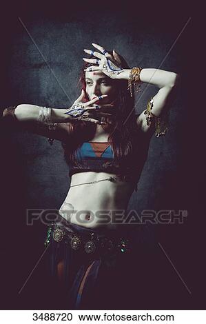 Stock Image - Portrait of a sensual woman in ethnic dress. Fotosearch