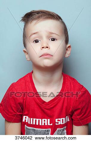 Portrait of a shocked boy View Large Photo Image Stock Image - Portrait of a shocked boy. Fotosearch