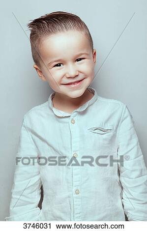 Stock Image - Portrait of a smiling boy. Fotosearch