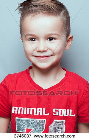 Portrait of a smiling boy View Large Photo Image Stock Photo - Portrait of a smiling boy. Fotosearch