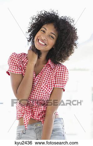 Portrait of a smiling woman View Large Photo Image Stock Photograph - Portrait of a smiling woman. Fotosearch