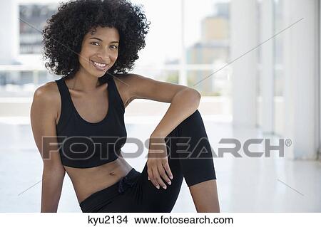 Portrait of a sportswoman smiling View Large Photo Image Picture - Portrait of a sportswoman smiling. Fotosearch