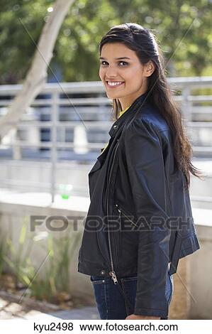 Stock Photo - Portrait of a woman smiling. Fotosearch