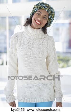 Stock Photograph - Portrait of a woman smiling. Fotosearch
