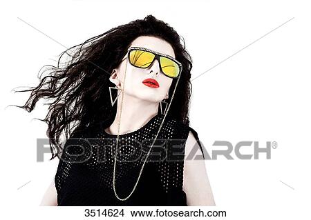 Portrait of a woman with glasses 80's style View Large Photo Image Picture - Portrait of a woman with glasses 80's style. Fotosearch