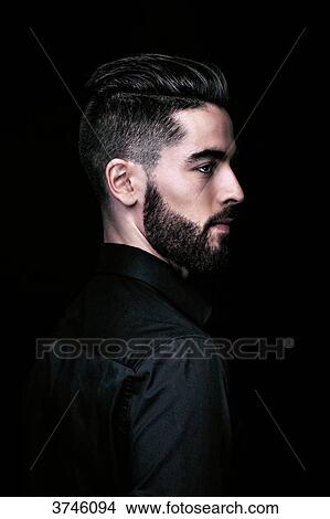 Portrait of a young man in profile View Large Photo Image Picture - Portrait of a young man in profile. Fotosearch