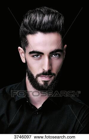 Portrait of a young man, look toward the lens View Large Photo Image Stock Photo - Portrait of a young man, look toward the lens. Fotosearch