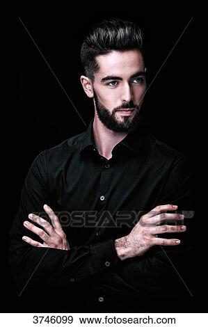 Portrait of a young man, looking to the side View Large Photo Image Stock Photo - Portrait of a young man, looking to the side. Fotosearch