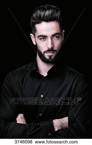 Portrait of a young man, the mischievous look View Large Photo Image Stock Photo - Portrait of a young man, the mischievous look. Fotosearch