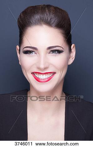 Portrait of a young woman a big smile View Large Photo Image Stock Image - Portrait of a young woman a big smile. Fotosearch