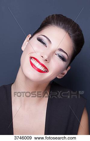 Portrait of a young woman a big smile View Large Photo Image Stock Photo - Portrait of a young woman a big smile. Fotosearch