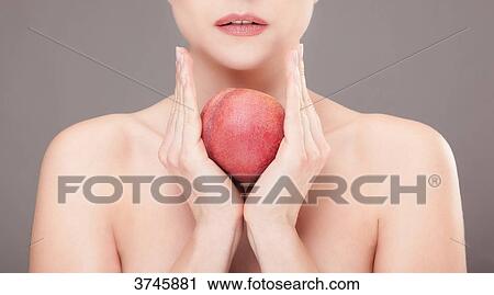 Portrait of a young woman holding a fish in his hands View Large Photo Image Stock Image - Portrait of a young woman holding a fish in his hands. Fotosearch