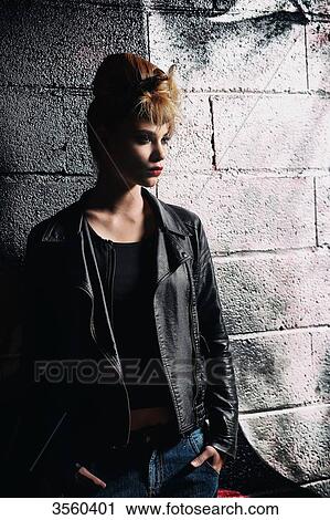 Portrait of a young woman in the dark View Large Photo Image Stock Image - Portrait of a young woman in the dark. Fotosearch