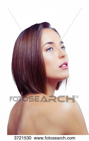 Portrait of a young woman looking to the side View Large Photo Image Stock Image - Portrait of a young woman looking to the side. Fotosearch