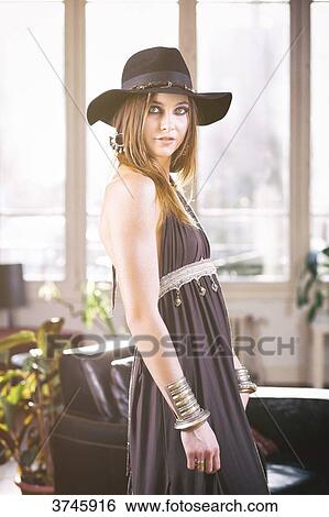 Portrait of a young woman, wearing a cap and gown Sanhadja View Large Photo Image Stock Photograph - Portrait of a young woman, wearing a cap and gown Sanhadja. Fotosearch