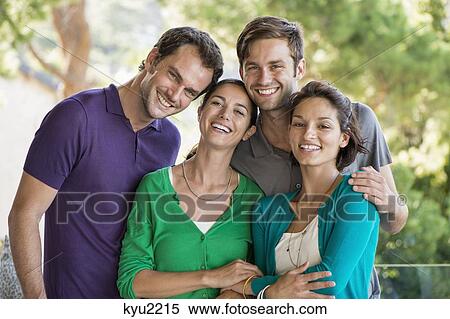 Portrait of four friends smiling View Large Photo Image Stock Photography - Portrait of four friends smiling. Fotosearch