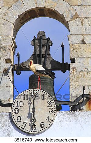 Stock Image - Portugal, Algarve. Faro. Arco da Vila (City's Arch). Entrance door leading to the old city. Stork.. Fotosearch