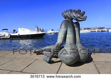 Portugal, Algarve. Faro. Statue in the harbour. View Large Photo Image Stock Image - Portugal, Algarve. Faro. Statue in the harbour.. Fotosearch