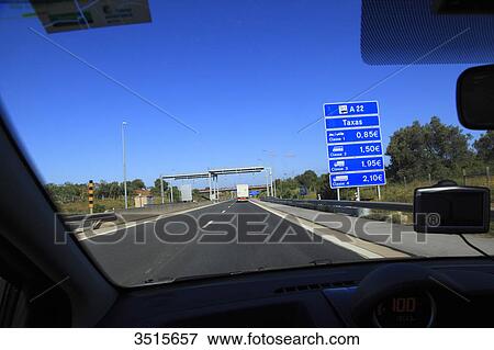 Stock Photo - Portugal, Algarve. Highway automatic toll gateway.. Fotosearch