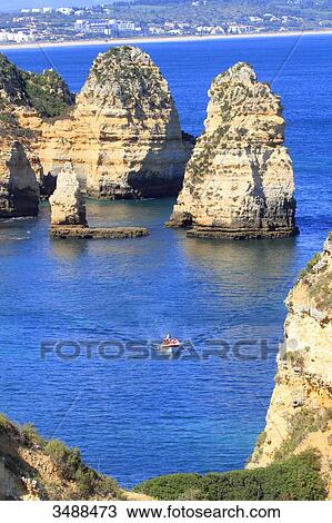 Portugal, Algarve, Lagos. Sculpted cliffs of Ponta da Piedade. View Large Photo Image Stock Image - Portugal, Algarve, Lagos. Sculpted cliffs of Ponta da Piedade.. Fotosearch