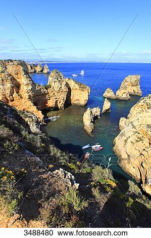 Portugal, Algarve, Lagos. Sculpted cliffs of Ponta da Piedade. View Large Photo Image Stock Image - Portugal, Algarve, Lagos. Sculpted cliffs of Ponta da Piedade.. Fotosearch