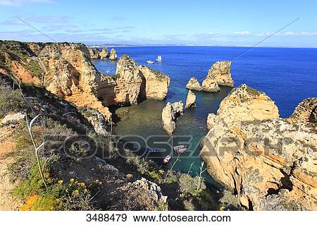 Portugal, Algarve, Lagos. Sculpted cliffs of Ponta da Piedade. View Large Photo Image Stock Photo - Portugal, Algarve, Lagos. Sculpted cliffs of Ponta da Piedade.. Fotosearch