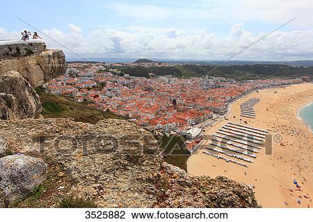Portugal, Nazare. Nazare beach and its beach tents. View Large Photo Image Stock Image - Portugal, Nazare. Nazare beach and its beach tents.. Fotosearch