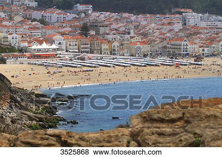 Portugal, Nazare. Nazare beach and its beach tents. View Large Photo Image Stock Photo - Portugal, Nazare. Nazare beach and its beach tents.. Fotosearch