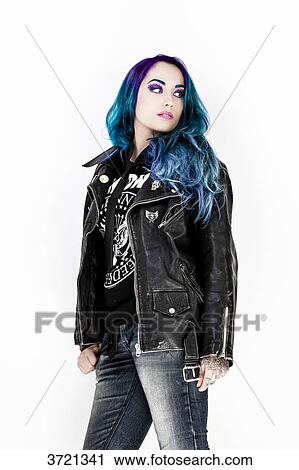 Profile of a pretty girl with blue hair, blue jeans and perfecto View Large Photo Image Stock Image - Profile of a pretty girl with blue hair, blue jeans and perfecto. Fotosearch