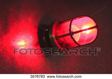 Red bulkhead lamp in a ship. View Large Photo Image Stock Image - Red bulkhead lamp in a ship.. Fotosearch
