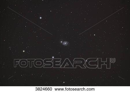 Seine et Marne. At the heart of the constellation Hunting Dogs (Canes venatici) a galaxy (M51 - Whirlpool) seems lost among the stars. View Large Photo Image Stock Image - Seine et Marne. At the heart of the constellation Hunting Dogs (Canes venatici) a galaxy (M51 - Whirlpool) seems lost among the stars.. Fotosearch