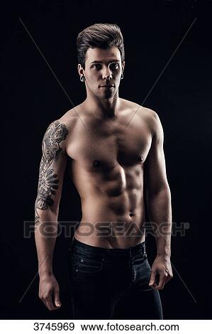 Shirtless young man, face, eyes toward the camera View Large Photo Image Stock Photo - Shirtless young man, face, eyes toward the camera. Fotosearch