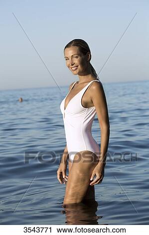 Smilling young woman in the sea View Large Photo Image Stock Image - Smilling young woman in the sea. Fotosearch