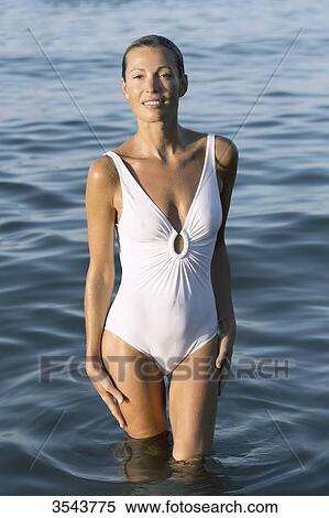 Smilling young woman out of the sea View Large Photo Image Stock Photography - Smilling young woman out of the sea. Fotosearch