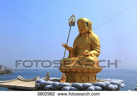 South Korea, Busan. Haedong Yonggungsa temple. Golden statue of Buddha View Large Photo Image Stock Image - South Korea, Busan. Haedong Yonggungsa temple. Golden statue of Buddha. Fotosearch