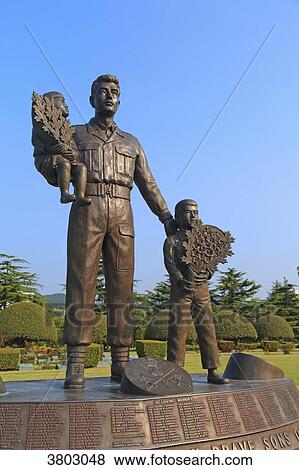 Stock Photo - South Korea, Busan. United Nations Memorial Cemetery. Canadian memorial statue. Fotosearch