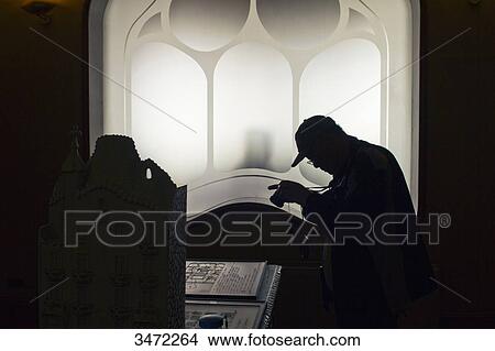 Spain, Catalonia, Barcelona, Casa Batllo (architect: Antoni Gaudi), tourist taking a picture of a document View Large Photo Image Picture - Spain, Catalonia, Barcelona, Casa Batllo (architect: Antoni Gaudi), tourist taking a picture of a document. Fotosearch