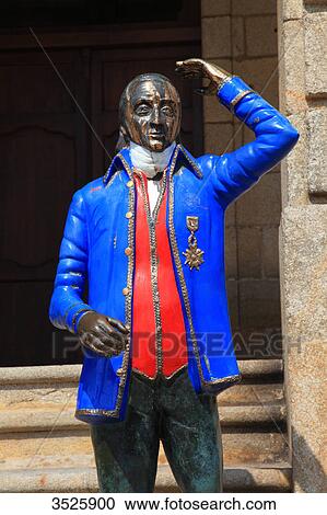Stock Image - Spain, Galicia. Ribadeo. Historical centre. Staue of Marquis de Sargadelos in front of Pazo de Ibanez, Ribadeo city hall.. Fotosearch