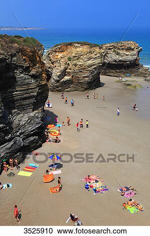 Spain, Galicia. Ribadeo. People on Las Catedrales beach. View Large Photo Image Stock Image - Spain, Galicia. Ribadeo. People on Las Catedrales beach.. Fotosearch