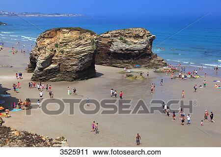 Spain, Galicia. Ribadeo. People on Las Catedrales beach. View Large Photo Image Stock Image - Spain, Galicia. Ribadeo. People on Las Catedrales beach.. Fotosearch