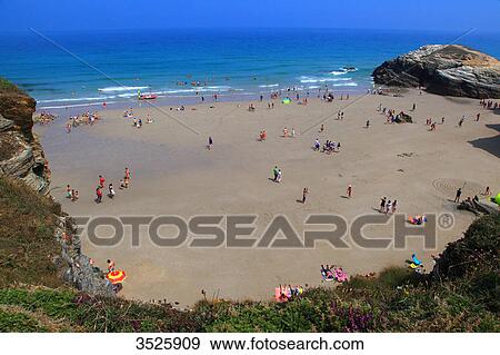 Spain, Galicia. Ribadeo. People on Las Catedrales beach. View Large Photo Image Stock Photo - Spain, Galicia. Ribadeo. People on Las Catedrales beach.. Fotosearch