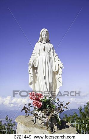 Stock Photo - Statue of The Madonna dell'Accoglienza Sanctuary of St Michael the Archangel, Monte Faito, Campania, Italy. Fotosearch