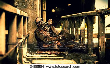 Picture - Steampunk man injecting an antidote. Fotosearch