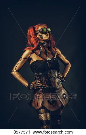 Steampunk robot woman with red hair standing with hands on hips View Large Photo Image Stock Image - Steampunk robot woman with red hair standing with hands on hips. Fotosearch