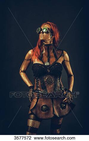Steampunk robot woman with red hair standing with hands on hips View Large Photo Image Stock Image - Steampunk robot woman with red hair standing with hands on hips. Fotosearch
