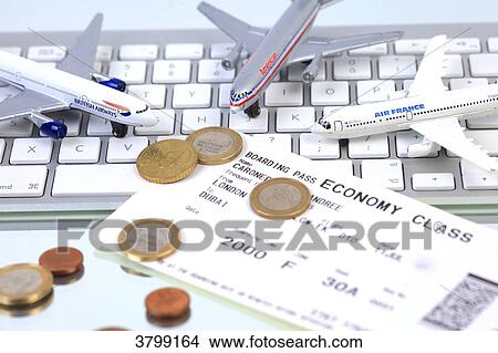 Still life on the topic of air travel prices View Large Photo Image Picture - Still life on the topic of air travel prices. Fotosearch